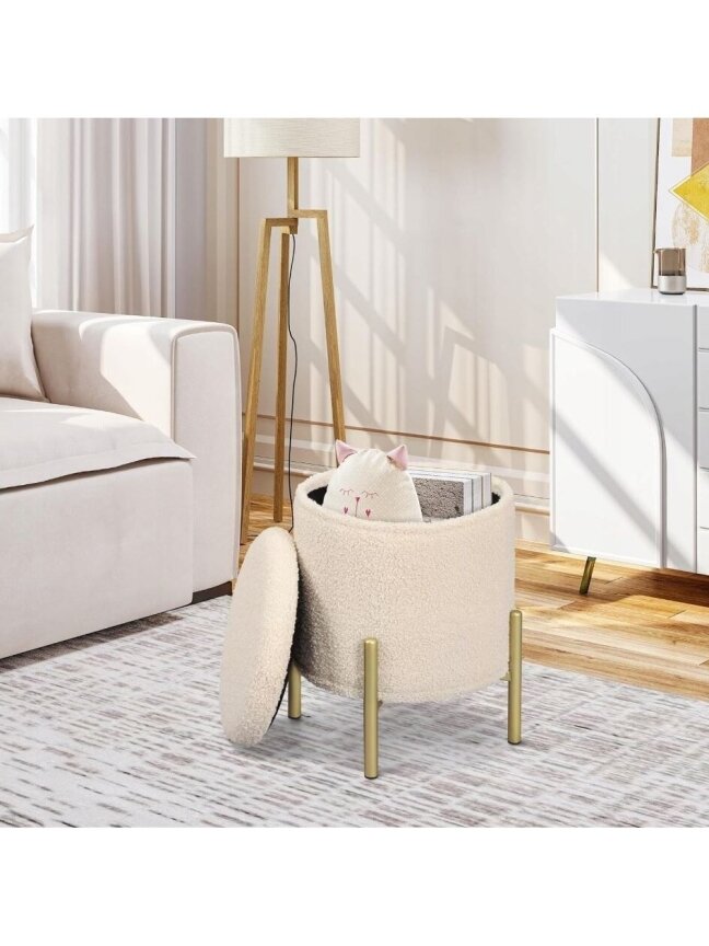Storage ottoman with hidden compartment, plush fabric upholstery, gold metal legs, beige color. Storage ottoman with hidden compartment, plush fabric upholstery, gold metal legs, beige color.